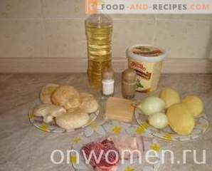 Месо со компири и печурки во садови во рерната